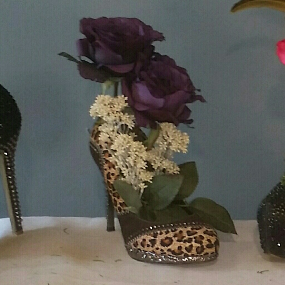 Shoe with faux flowers